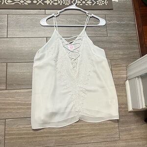 White tank that could be worn under a blazer or by itself.